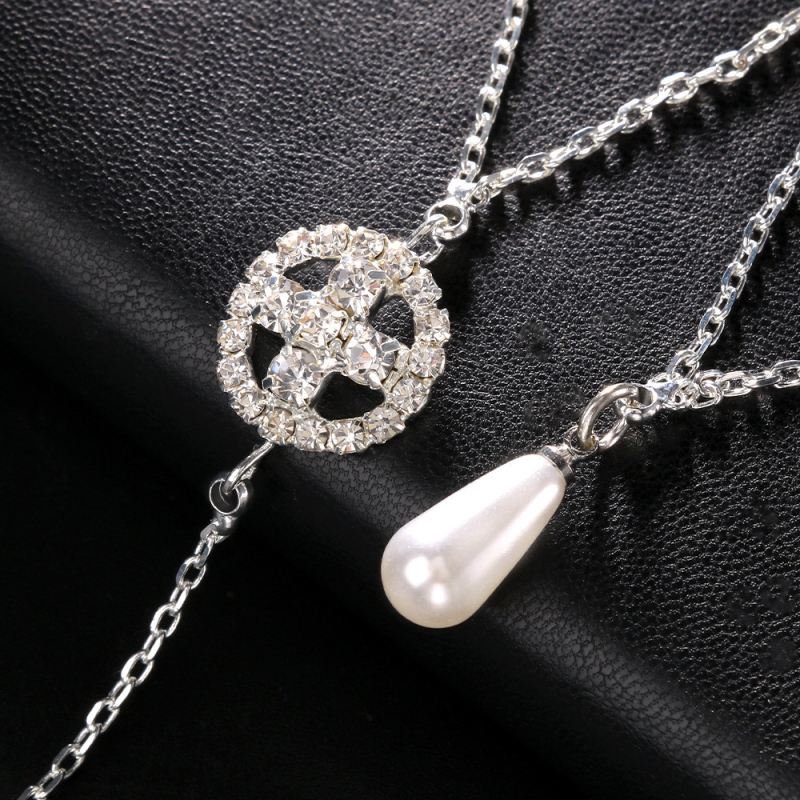 Nugaros kūno grandinė su geometriniu dizainu ir kryžiaus motyvu, elektroplatinuotas lydinys ir krištolo intarpai