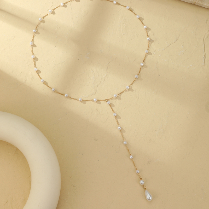 Nugaros grandinėlė su imitaciniais perlais ir kuteliais, rankų darbas iš lydinio, moterų Euro‑Amerikos stilius, geometrijinė forma