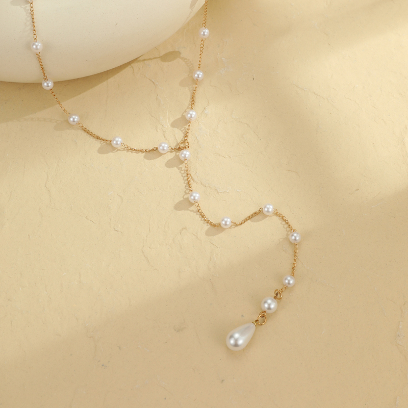 Nugaros grandinėlė su imitaciniais perlais ir kuteliais, rankų darbas iš lydinio, moterų Euro‑Amerikos stilius, geometrijinė forma