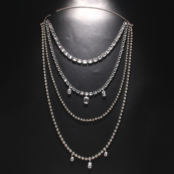 Hátsó testlánc üreges, többszintű geometriai dizájnnal, rhinestone betétekkel és fehér kristályokkal, rézötvözet elektroplattal