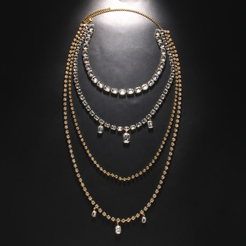 Hátsó testlánc üreges, többszintű geometriai dizájnnal, rhinestone betétekkel és fehér kristályokkal, rézötvözet elektroplattal