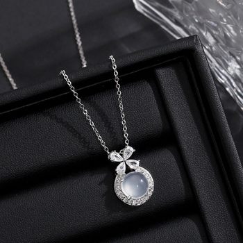 Ogrlica u obliku mašnice, s križnom lancom, Sterling srebro S999, duljina 41–50 cm
