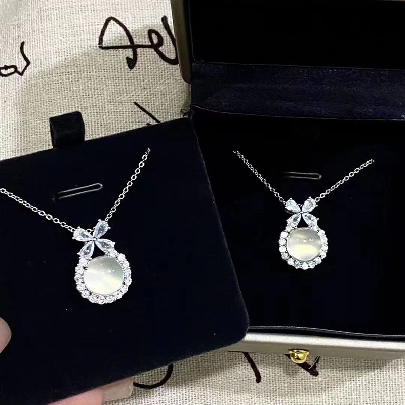 Ogrlica u obliku mašnice, s križnom lancom, Sterling srebro S999, duljina 41–50 cm