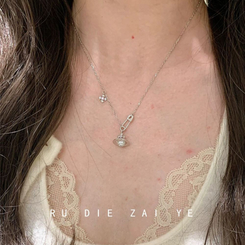 Vintage Iris Saturn ogrlica od bakra, jesensko izdanje 2025