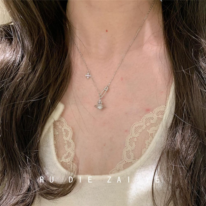 Vintage Iris Saturn ogrlica od bakra, jesensko izdanje 2025