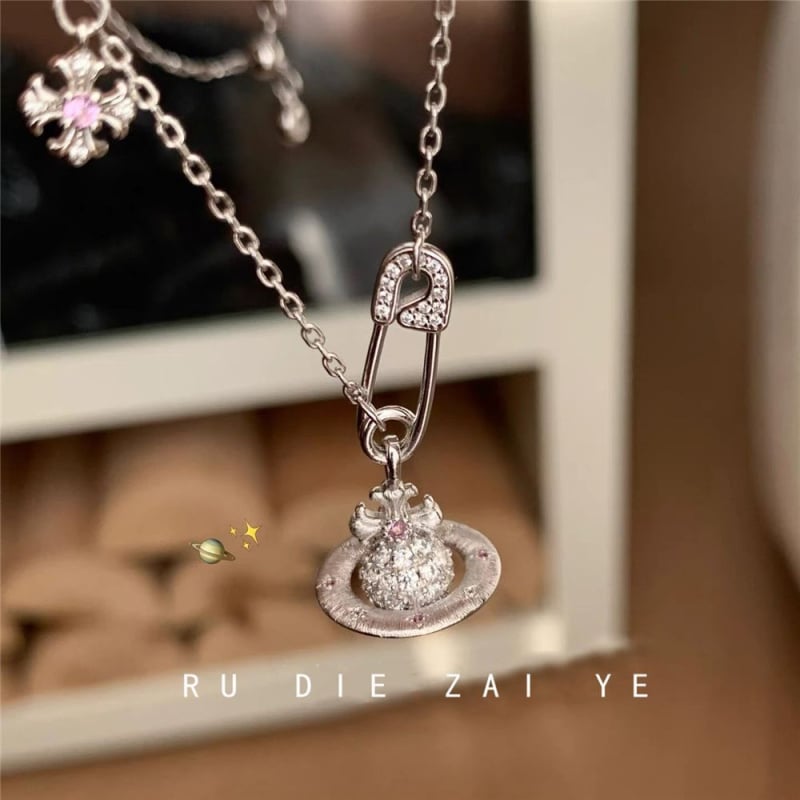 Vintage Iris Saturn ogrlica od bakra, jesensko izdanje 2025