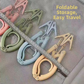 Ruhaakasztó klippel – teleszkópos, hordozható összecsukható ruhatartó (műanyag, 100% új anyag; ruhák, nadrágok és nyakkendők számára)