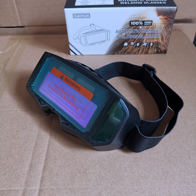 Galvas nēsājamās automātiskās tumšēšanas aizsargbrilles, ABS rāmis, 30 mm lēca, gaismas caurlaidība 9–13%, standarts GB21551335-2006