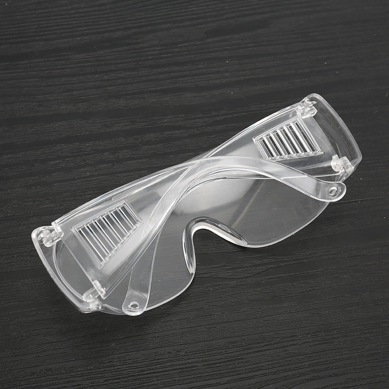 Aizsargbrilles no PC materiāla, caurspīdīgas lēcas, standarta lēcu biezums, standarta gaismas caurlaidība, aizsardzība pret šļakatām, putekļiem un trieciens