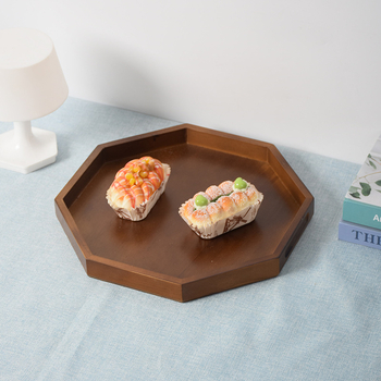 Puidust oktagonaalne demonstratsioonialus küpsistele ja puuviljadele; logoprindus on saadaval.