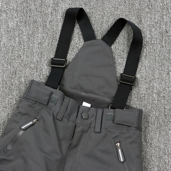 Gyerekeknek szóló egy darabos síoverál vállpántokkal – szélvédett, vízálló és meleg, 100% poliészter anyagú külső, pamut töltetű