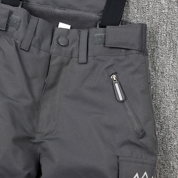 Gyerekeknek szóló egy darabos síoverál vállpántokkal – szélvédett, vízálló és meleg, 100% poliészter anyagú külső, pamut töltetű