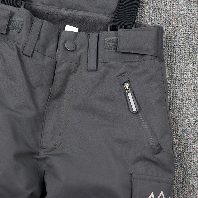 Gyerekeknek szóló egy darabos síoverál vállpántokkal – szélvédett, vízálló és meleg, 100% poliészter anyagú külső, pamut töltetű