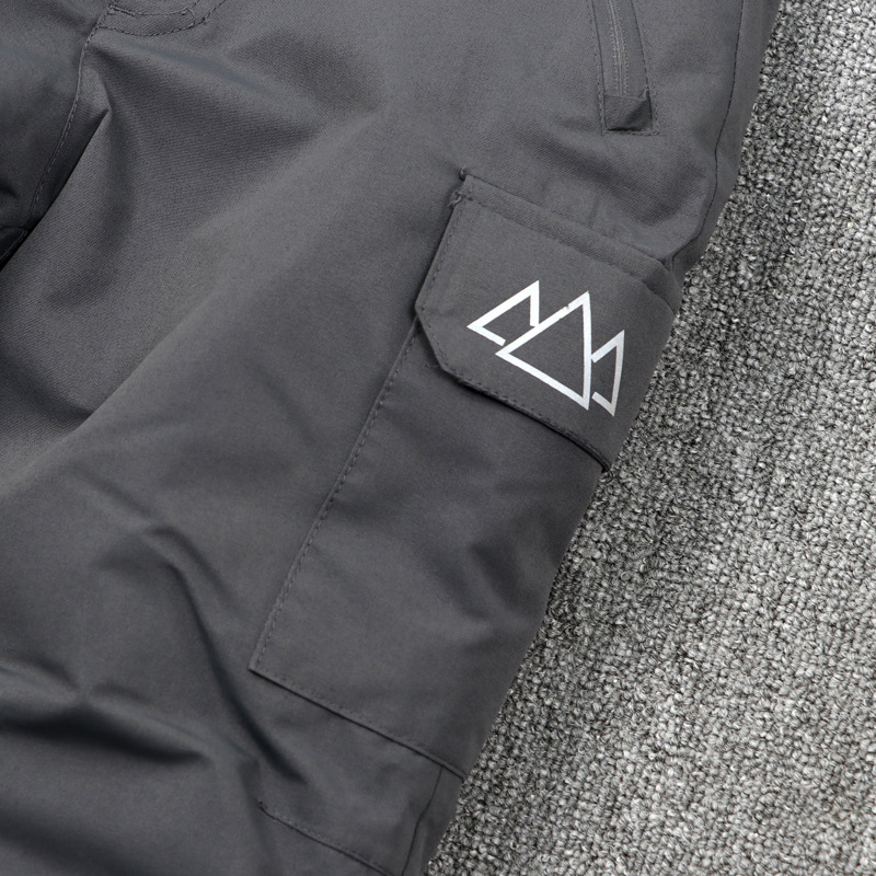 Gyerekeknek szóló egy darabos síoverál vállpántokkal – szélvédett, vízálló és meleg, 100% poliészter anyagú külső, pamut töltetű