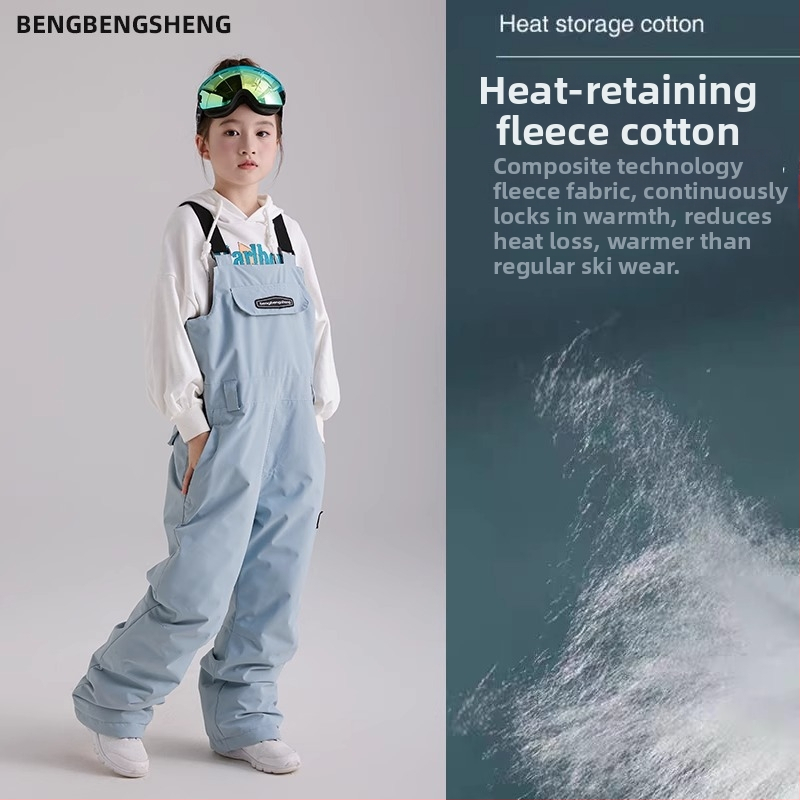 Bērnu slēpošanas bikses ar siksnām – ūdensizturīgas, pret vēju un silti; pildījums: kokvilna; zīmols Bounce rope; preču kods H005_