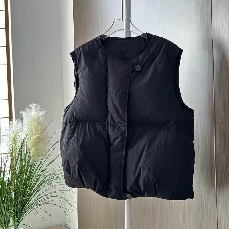 Γυναικείο γιλέκο με γέμισμα πολυεστέρα-βαμβάκι, κοντό, χαλαρή γραμμή (γέμισμα: πολυεστέρας-βαμβάκι; ύφασμα: πολυεστέρας; μήκος: 50–65 εκ.)