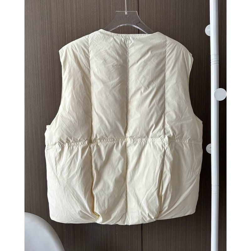 Γυναικείο γιλέκο με γέμισμα πολυεστέρα-βαμβάκι, κοντό, χαλαρή γραμμή (γέμισμα: πολυεστέρας-βαμβάκι; ύφασμα: πολυεστέρας; μήκος: 50–65 εκ.)