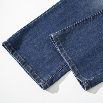 Férfi farmernadrág, egyenes szabású, magas derék, cipzáras záródás, pamut denim, enzimes és homokos mosás