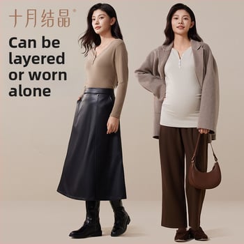 Nėščiųjų terminis pagrindinis marškinėliai su V kaklu ir gobtuvu, ilgomis rankovėmis, laisvas kirpimas, rudens–žiemos 2025. Polietesteris 90–95%, spandexas iki 30%