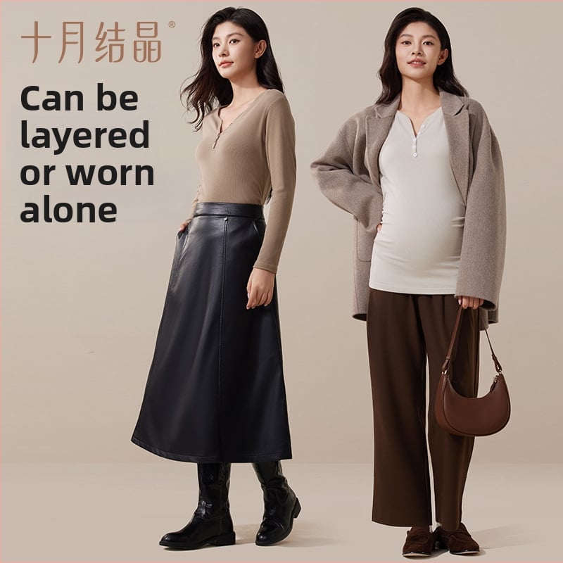 Nėščiųjų terminis pagrindinis marškinėliai su V kaklu ir gobtuvu, ilgomis rankovėmis, laisvas kirpimas, rudens–žiemos 2025. Polietesteris 90–95%, spandexas iki 30%