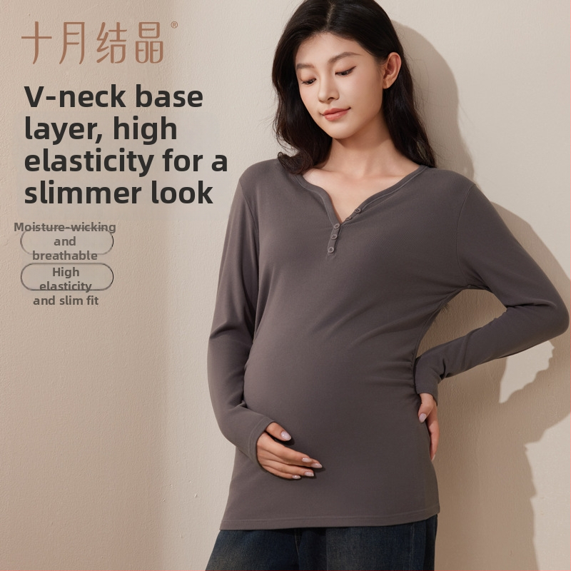 Nėščiųjų terminis pagrindinis marškinėliai su V kaklu ir gobtuvu, ilgomis rankovėmis, laisvas kirpimas, rudens–žiemos 2025. Polietesteris 90–95%, spandexas iki 30%