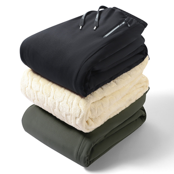 Férfi téli sportnadrág fleece-béléssel, egyenes szabású, középmagas derék, poliészter anyag, töltés selyem-pamut.