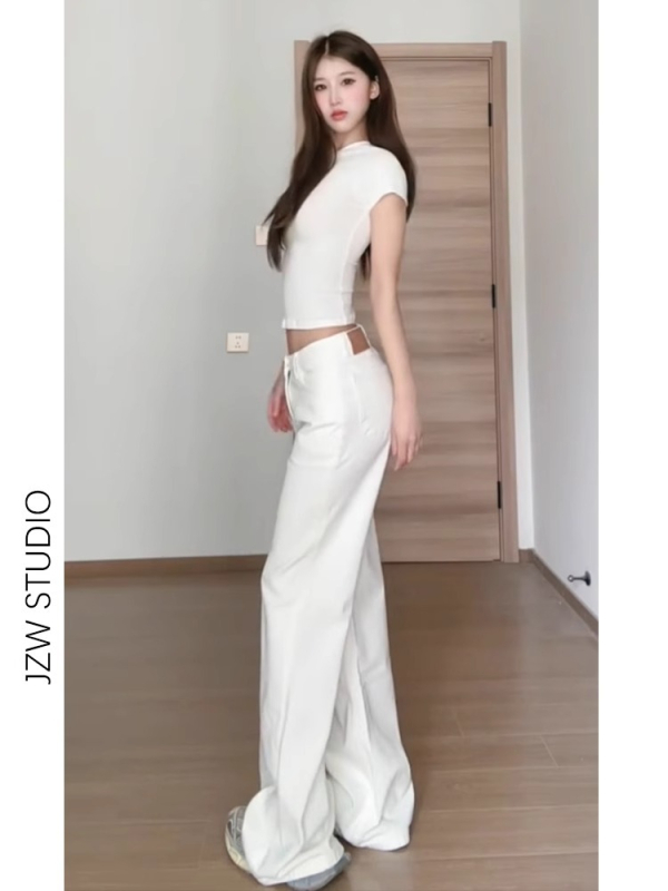 Ženske traperice s niskim strukom, bootcut kroj, elastični denim, dužina do poda.