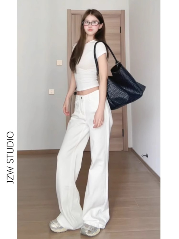 Ženske traperice s niskim strukom, bootcut kroj, elastični denim, dužina do poda.