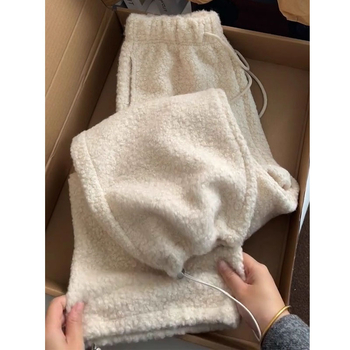 Női magas derekú vastagított kötős jogger nadrág, elasztikus derék, egyenes szabás