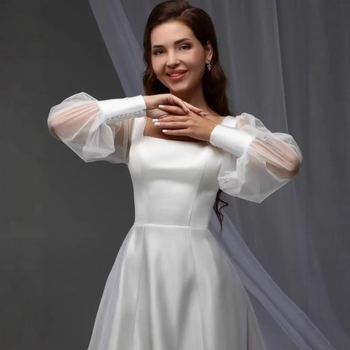 Rochie de mireasă în linie A, talie înaltă, fără mâneci, țesătură poliester 80–90%, toamna 2025