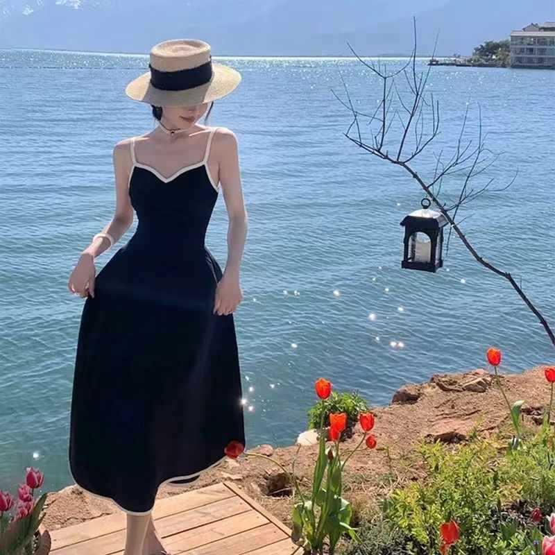 Haljina dugog kroja u umjetničkom vintage stilu s V izrezom, bez rukava, srednji struk, TR tkanina