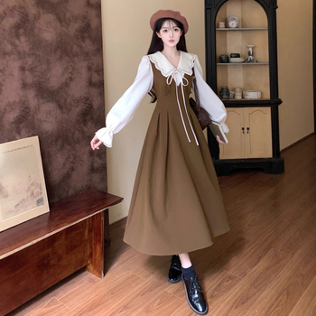 Haljina plus veličine u francuskom stilu, lažni dvodijelni kroj, ovratnik lutke, naglašena struk, retro elegancija, midi duljina.
