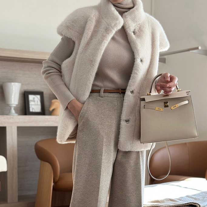 Vesta din blană de nurcă, guler polo, lungime 50–65 cm, Iarna 2025