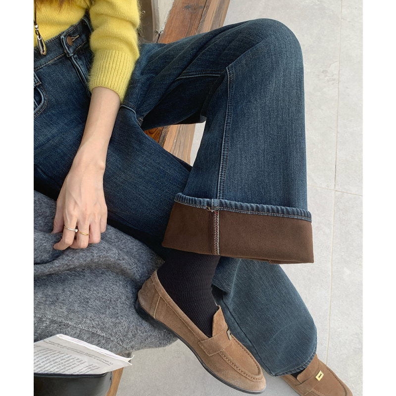 Sieviešu ziemas džinsi ar velūra oderi, platā bootcut griezums, kokvilna 50–70%, regulējama josta