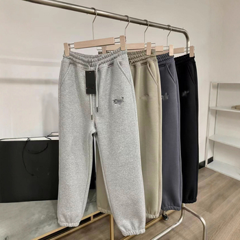 Naiste puuvillase fleece joggerid brodateeritud lindudega logoga, kõrge vöökoht, vaba lõige, sirged sääred, keskmise paksusega