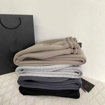 Naiste puuvillase fleece joggerid brodateeritud lindudega logoga, kõrge vöökoht, vaba lõige, sirged sääred, keskmise paksusega