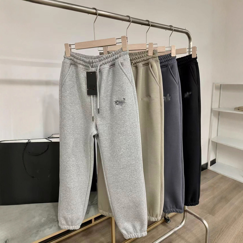 Naiste puuvillase fleece joggerid brodateeritud lindudega logoga, kõrge vöökoht, vaba lõige, sirged sääred, keskmise paksusega