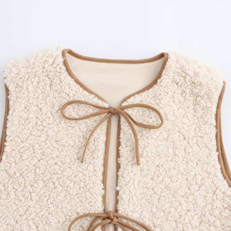 Γυναικείο φλις γιλέκο με στρογγυλή λαιμόκοψη και κορδόνι μπροστά | βασικό ύφαντό ύφασμα πολυεστέρας 90–95% | γέμισμα πολυεστερικό-βαμβάκι