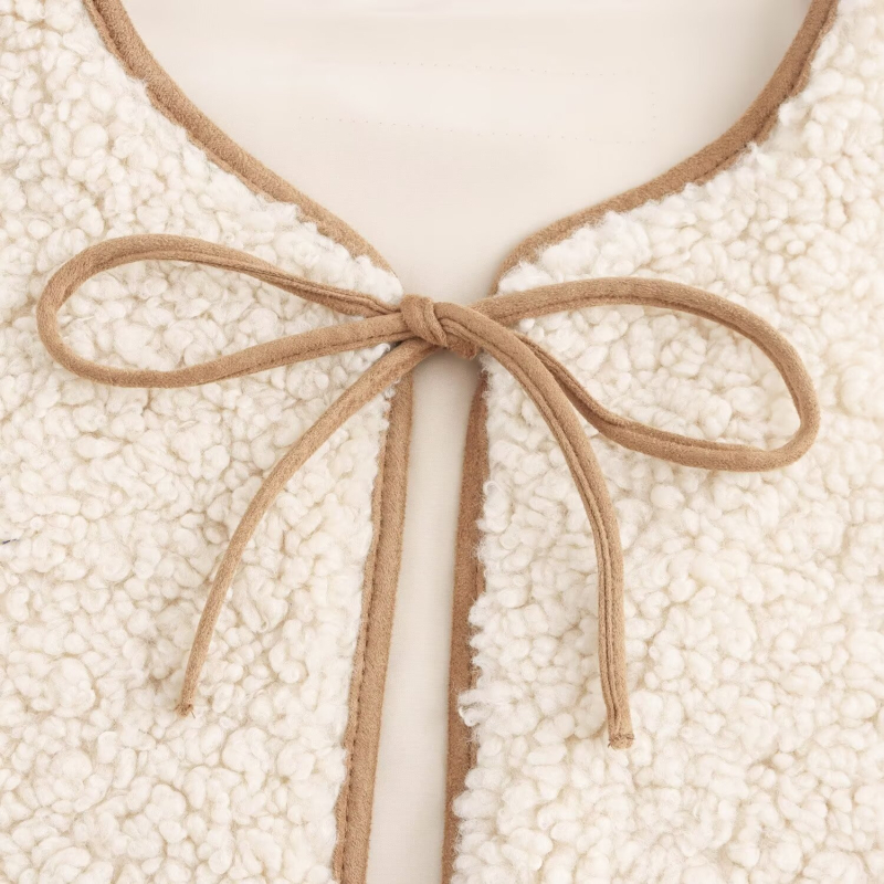 Γυναικείο φλις γιλέκο με στρογγυλή λαιμόκοψη και κορδόνι μπροστά | βασικό ύφαντό ύφασμα πολυεστέρας 90–95% | γέμισμα πολυεστερικό-βαμβάκι