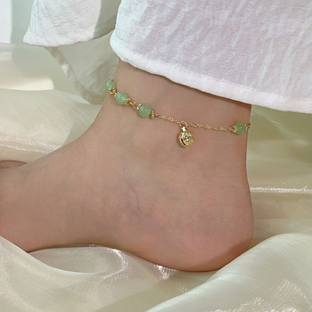 Brățară de gleznă cu piatră naturală și clopoțel; stil retro unisex; forme: floare, U, picătură; cod producție YD107; vara 2025