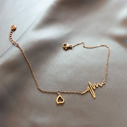 Anklet za žene – dizajn otkucaja srca, titan čelik; Materijal: titan čelik; Vrsta: anklet; Stil: ženski; Podrijetlo: Jinhua; Kategorija: stopalo