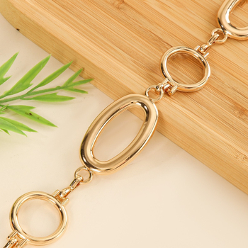 Fém derékszíj lánc kivágott kör alakú elemekkel, geometriai dizájn, nőknek, hossz 115 cm, szélesség 6 cm