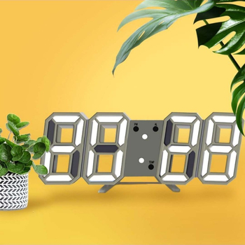 Ceas de alarmă cu afișaj LED, alimentat cu baterii, mecanism electronic, carcasă din plastic, stil modern minimalist.