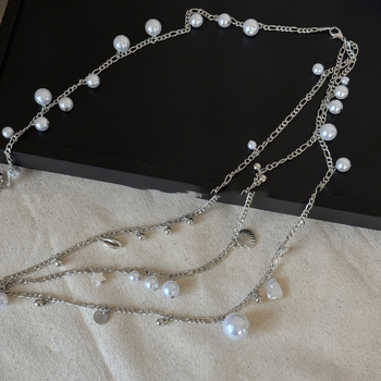 Francia stílusú, többrétegű deréklánc, fém anyagból, héjgyöngyökkel, könnyű luxus megjelenés, női viselet