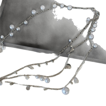 Francia stílusú, többrétegű deréklánc, fém anyagból, héjgyöngyökkel, könnyű luxus megjelenés, női viselet