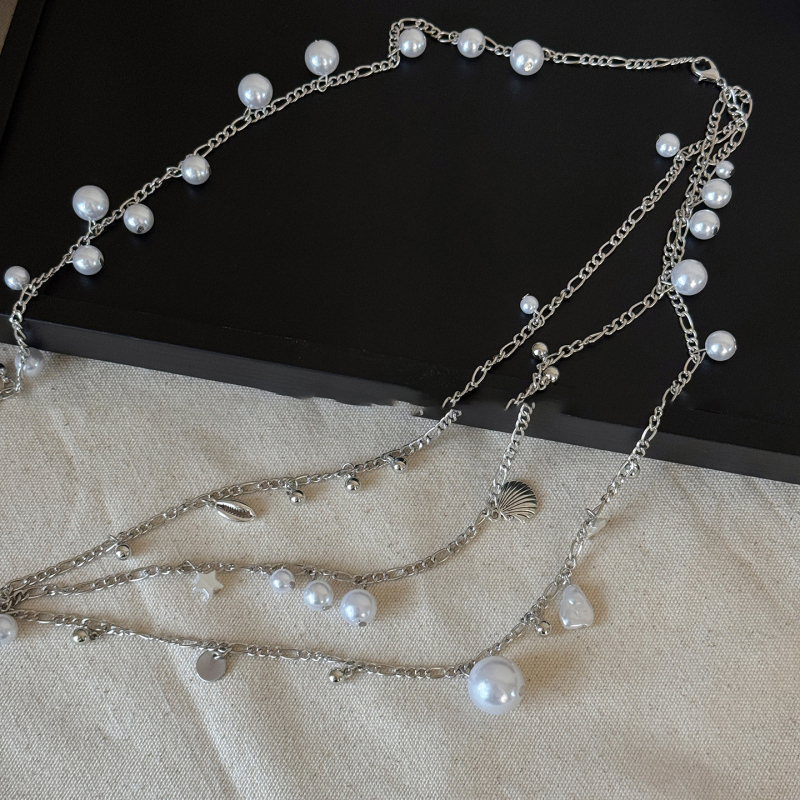 Francia stílusú, többrétegű deréklánc, fém anyagból, héjgyöngyökkel, könnyű luxus megjelenés, női viselet