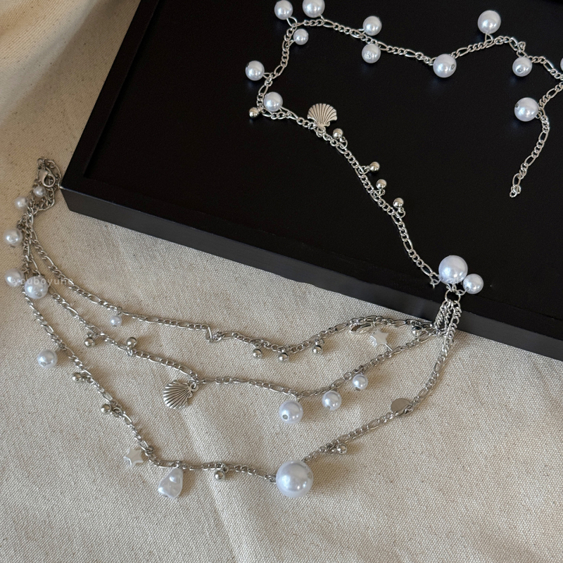 Francia stílusú, többrétegű deréklánc, fém anyagból, héjgyöngyökkel, könnyű luxus megjelenés, női viselet