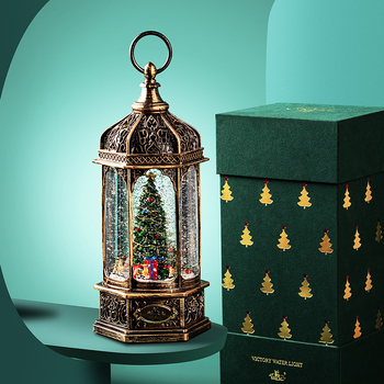 Bluetooth muzikinė dėžutė su besisukančia Kalėdų egle, snaigių sfere ir krištolo kamuoliu