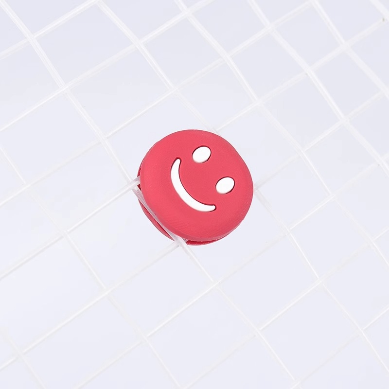 Silikoninis teniso raketės vibracijų slopintuvas su šypsena, apvalus dizainas