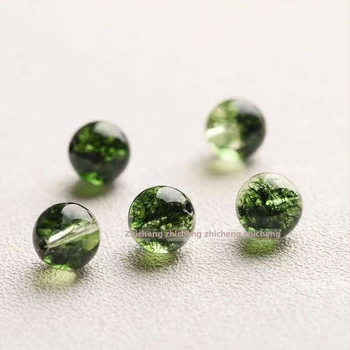 Szabadon felfűzhető gyöngyök mesterséges kristályból, polírozott felület, kerek alakú